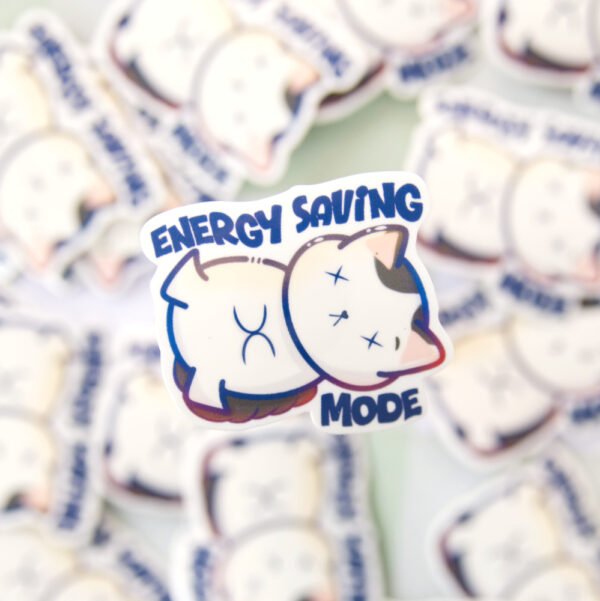 Illustrated cat lying down with a tired expression, accompanied by the text “energy saving mode” above it.