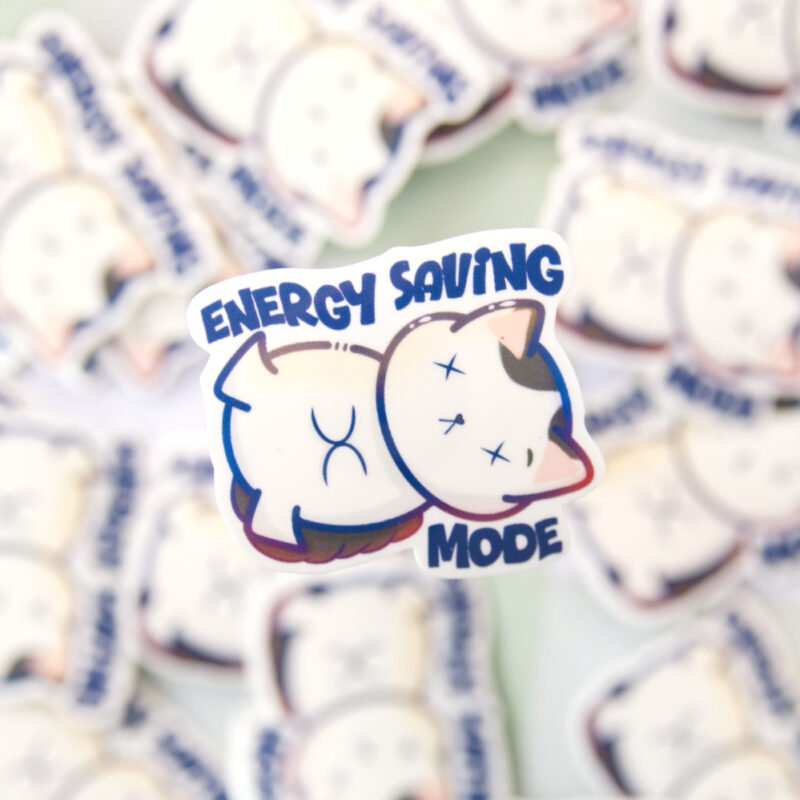 Illustrated cat lying down with a tired expression, accompanied by the text “energy saving mode” above it.