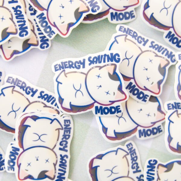 Several stickers of a cat lying down with a tired expression, accompanied by the text “energy saving mode” above it.