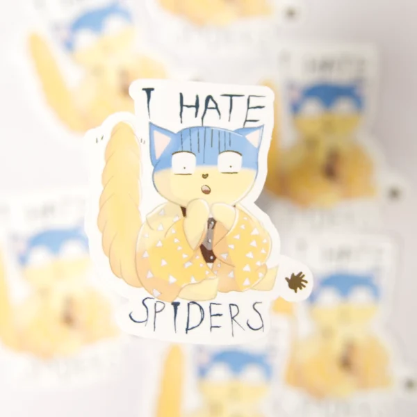 several stickers of a scared ginger cat with the words I hate spiders